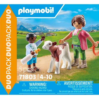 Duo : Fermière avec enfant donnant le biberon à un veau PLAYMOBIL