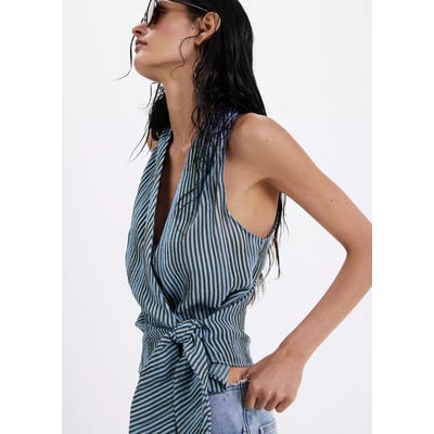 Blouse croisée à rayures et nœud MANGO