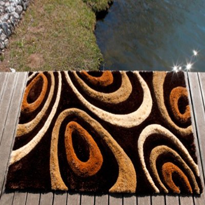 Tapis shaggy fait main motif rond TSUNAMI UN AMOUR DE TAPIS