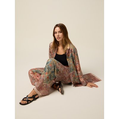 Pantalon palazzo réalisé en imprimé OLTRE