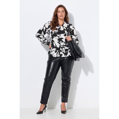 Pantalon 7/8 en similicuir. Passepoils et ULLA POPKEN