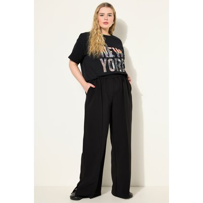 Pantalon à jambe large et taille élastique. STUDIO UNTOLD