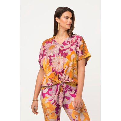 Tunique oversized à fleurs. Décolleté en ULLA POPKEN