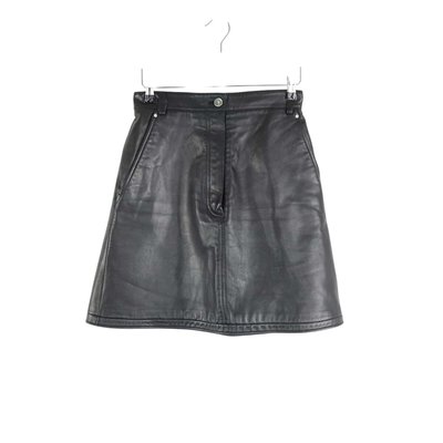 Mini jupe en cuir - Bon État CARVEN