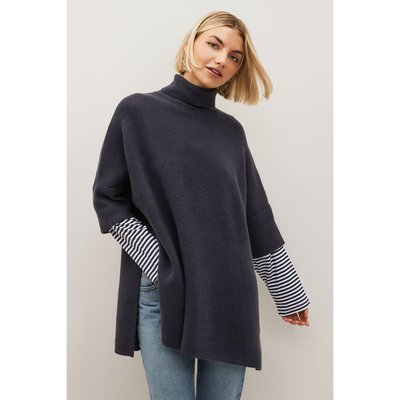 Poncho en maille avec rayures sur les manches NEXT