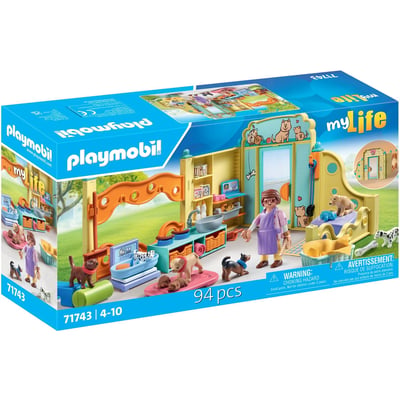 Centre de soin canin avec 8 chiens et soigneur PLAYMOBIL