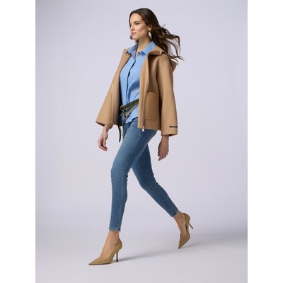 Jeans skinny realizzati in denim di cotone stretch a lavaggio chiaro OLTRE