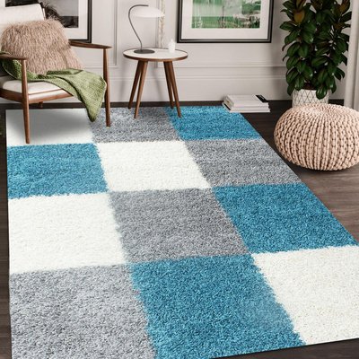 Tapis poils longs shaggy tissé motif damier CARRÉ A UN AMOUR DE TAPIS