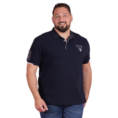Polo en coton marine uni pourvu d'une coupe droite et d'un col boutonné RUCKFIELD