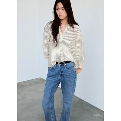 Blouse rayée avec détail à volant MANGO