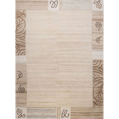 Tapis salon Nakarta, noué main, en laine THEKO