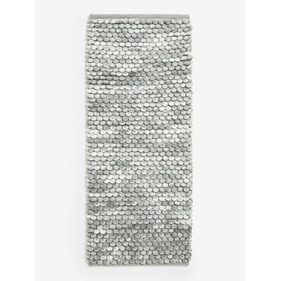 Tapis de bain à pompons NEXT