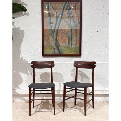 Paire de chaises en skaï Alma N°666 - Bon état DEBONGOUT