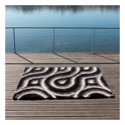 Tapis shaggy fait main motif rond CURVES UN AMOUR DE TAPIS
