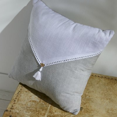 Coussin déhoussable avec pompon coton uni CHARME TODAY