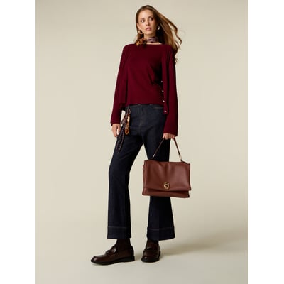 Jean flare taille haute avec charm OLTRE
