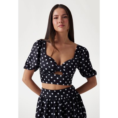 Haut À Pois Avec Un Nœud GUESS