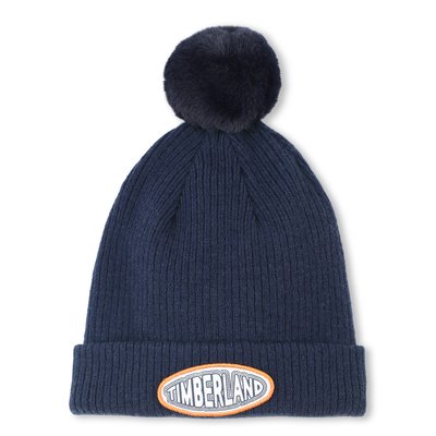 Bonnet tricoté avec des pompons en polaire TIMBERLAND