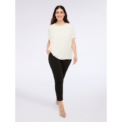 Encolure ronde avec applications bijoux, ouverture goutte d'eau avec bouton dans le dos. FIORELLA RUBINO