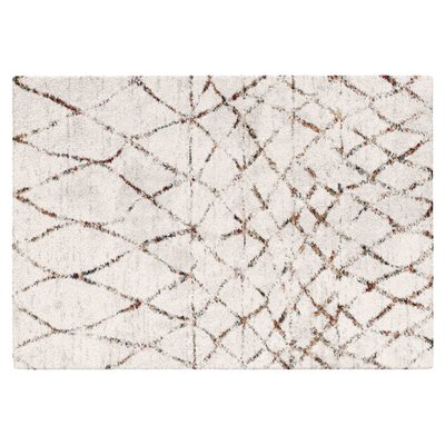 Tapis rectangulaire en polypropylène motifs ethnique à poils longs, ASMA OVIALA