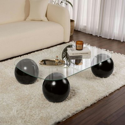 Table basse verre bords arrondis - 4 pieds boules noirs KOCHI PIER IMPORT