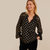 Polka dot print/black background