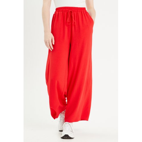 Pantalon rouge cache cache on sale