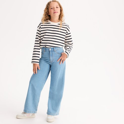 Jeans skinny noir avec noeuds sur les poches