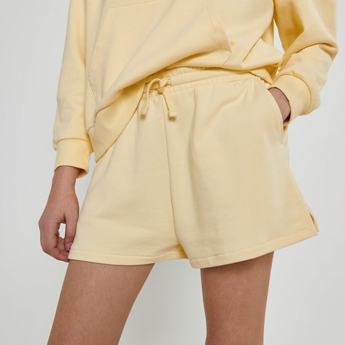 Pastel yellow shorts deals