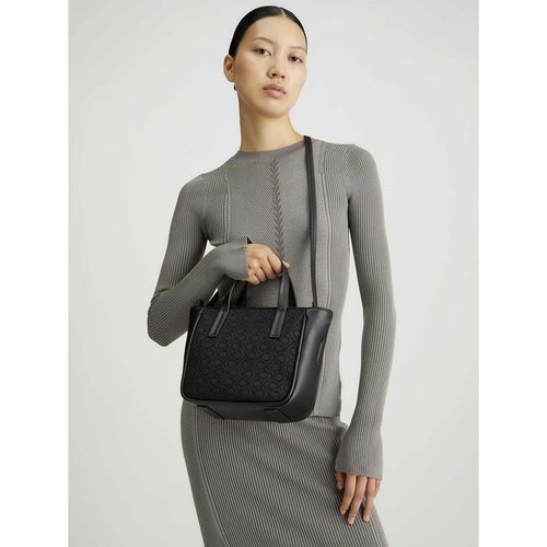 Calvin klein monogram tote bag online