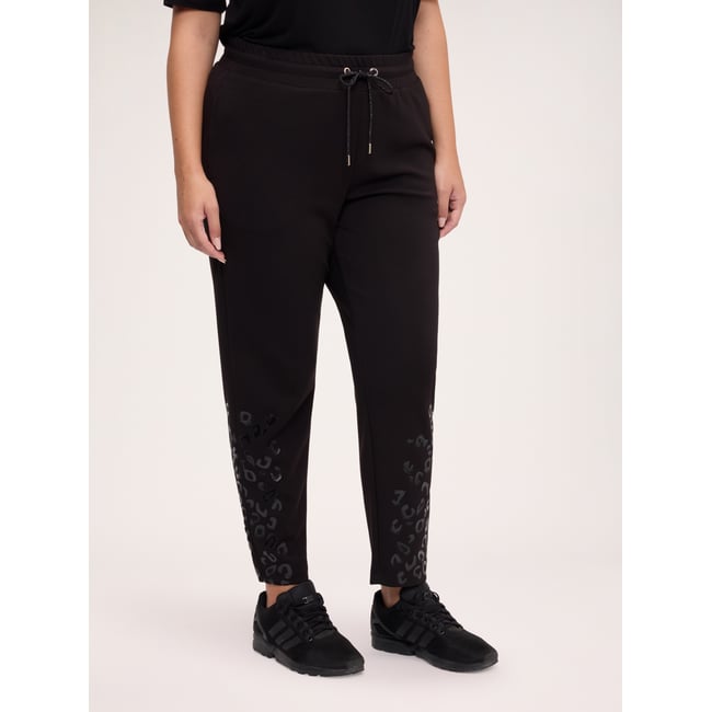 Jogger avec imprimé tacheté en relief noir <span itemprop=