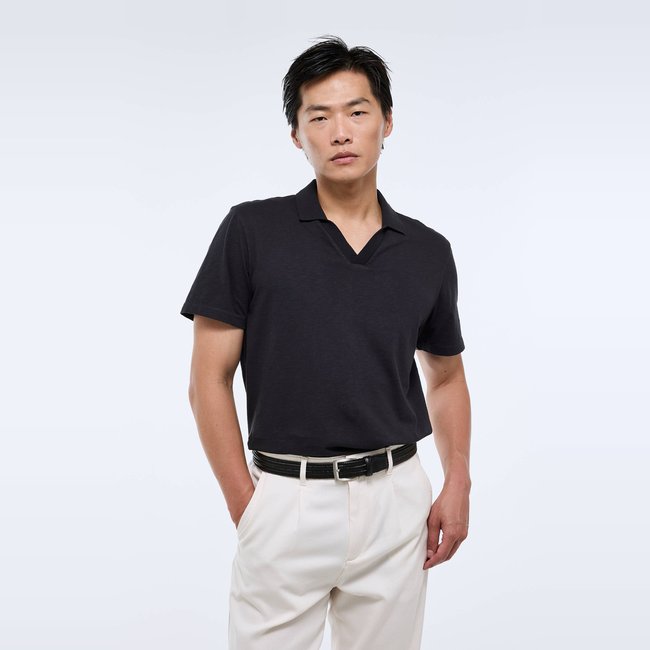 Polo manches courtes en coton slub noir <span itemprop=