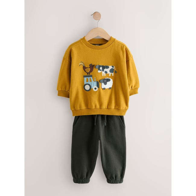 Sweat et pantalon de jogging appliqués ferme ocre jaune/charbon <span itemprop=