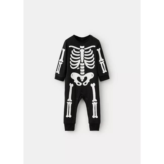 Pyjama combinaison squelette phosphorescent noir <span itemprop=