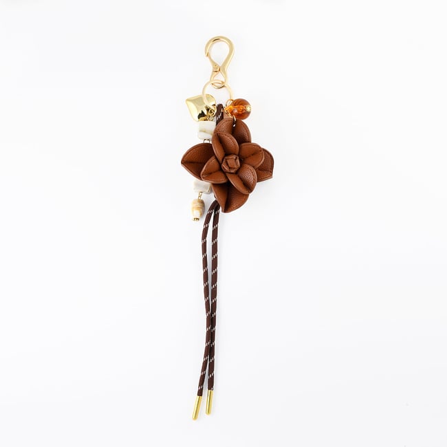 Bijoux de sac fleur et cordon marron marron <span itemprop=