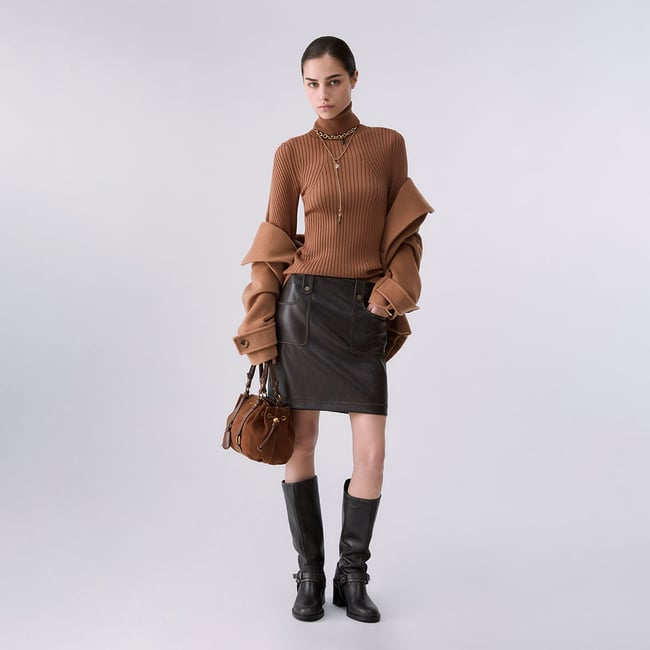 Col roulé avec manches ballon beige <span itemprop=