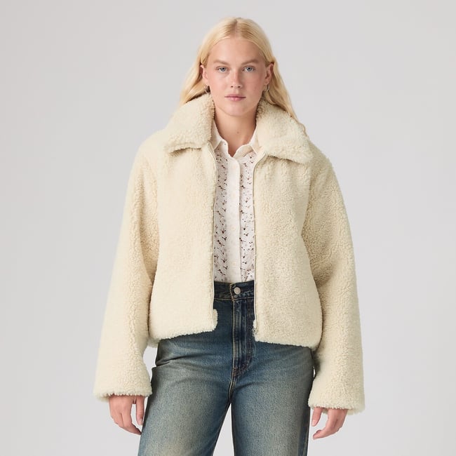 Veste courte zippée sherpa ecru <span itemprop=