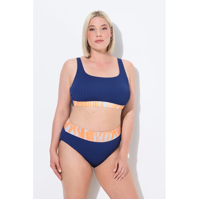 Bikini à bonnets souples. Bretelles marine <span itemprop=