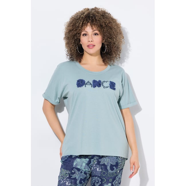 T-shirt oversize avec message vert mousse clair <span itemprop=