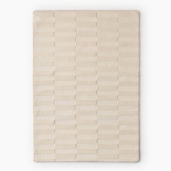 Grand tapis tufté damier rasé, 100% laine Couleur blanc <span itemprop=