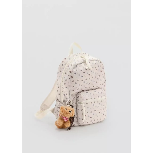 Sac à dos imprimé breloque chien sable <span itemprop=
