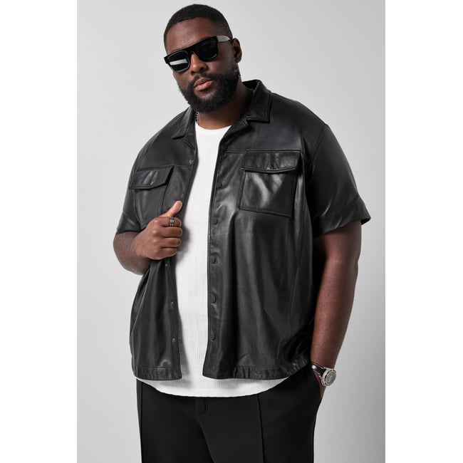 Chemise en cuir noir <span itemprop=