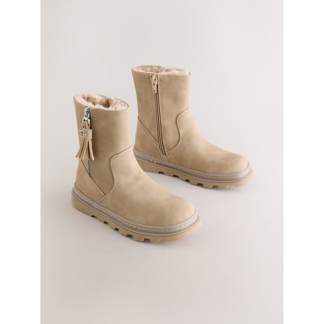 Bottes à pompons doublées de imitation fourrure naturel <span itemprop=