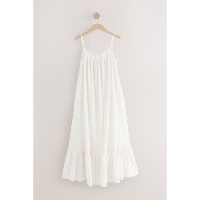 Robe longue fluide en coton crème <span itemprop=