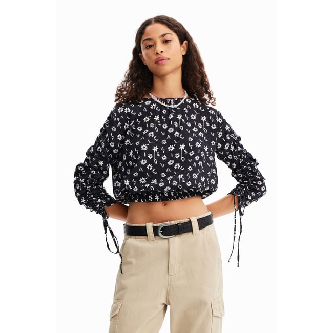 Blouse courte froncée fleurs bleu <span itemprop=