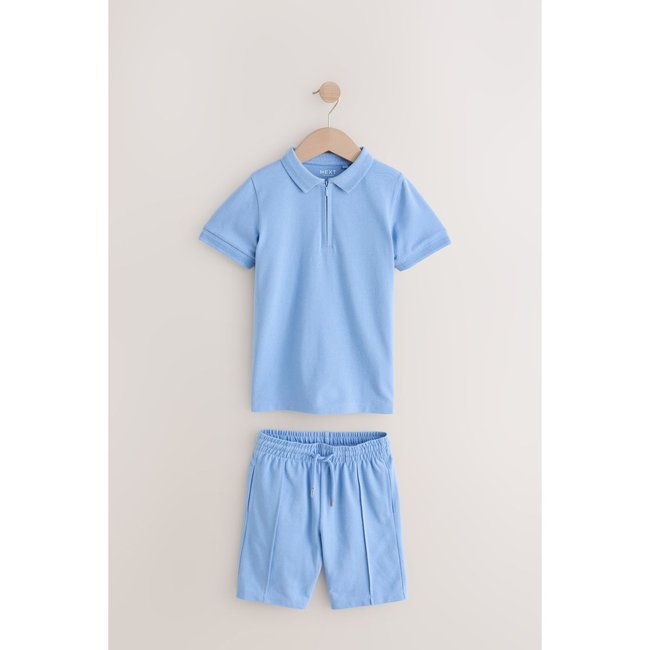 Short et polo à col zippé, ensemble bleu <span itemprop=
