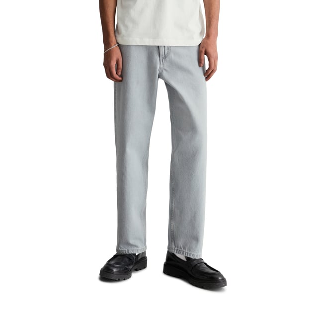 Jeans modèle Runne tapered en pur coton bio bleu clair <span itemprop=