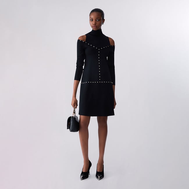 Robe courte en maille noir <span itemprop=