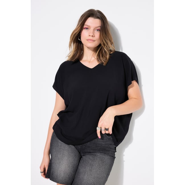 Blouse oversize, décolleté en V noir <span itemprop=
