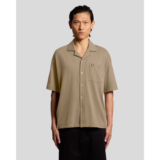 Chemise manches courtes col revers brun peluche <span itemprop=